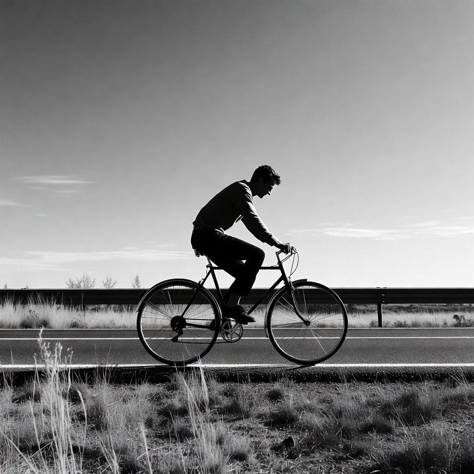 Biker riding on a road Biker riding on a road