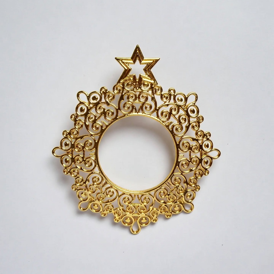 Gold decorative star ornament on white background Gold decorative star ornament on white background