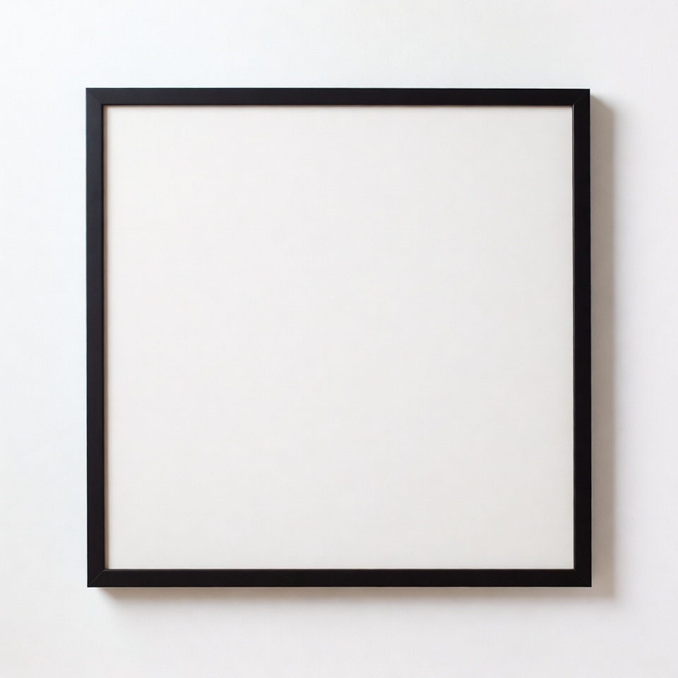 Empty black frame on white wall Empty black frame on white wall