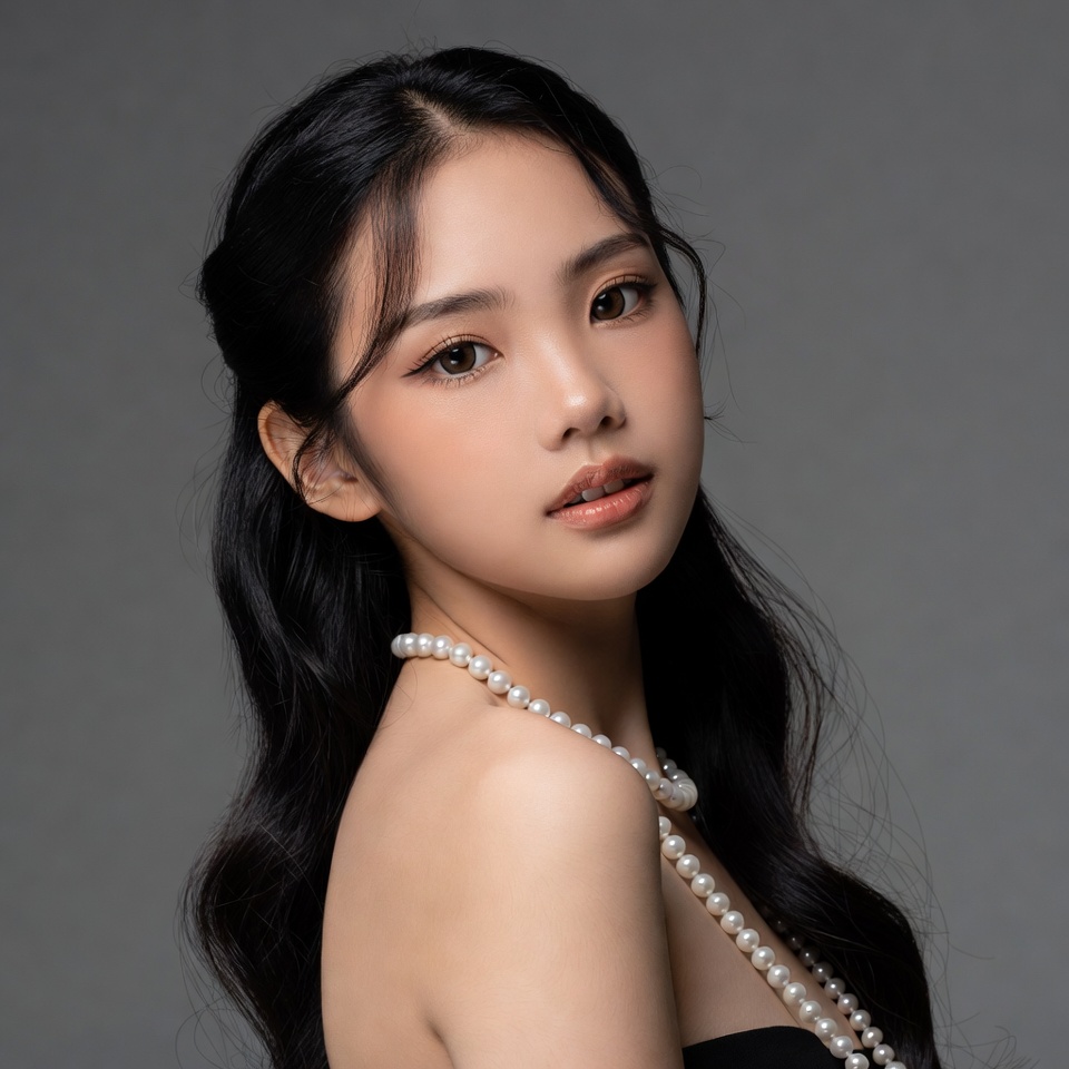 Young woman in portrait with pearls Young woman in portrait with pearls