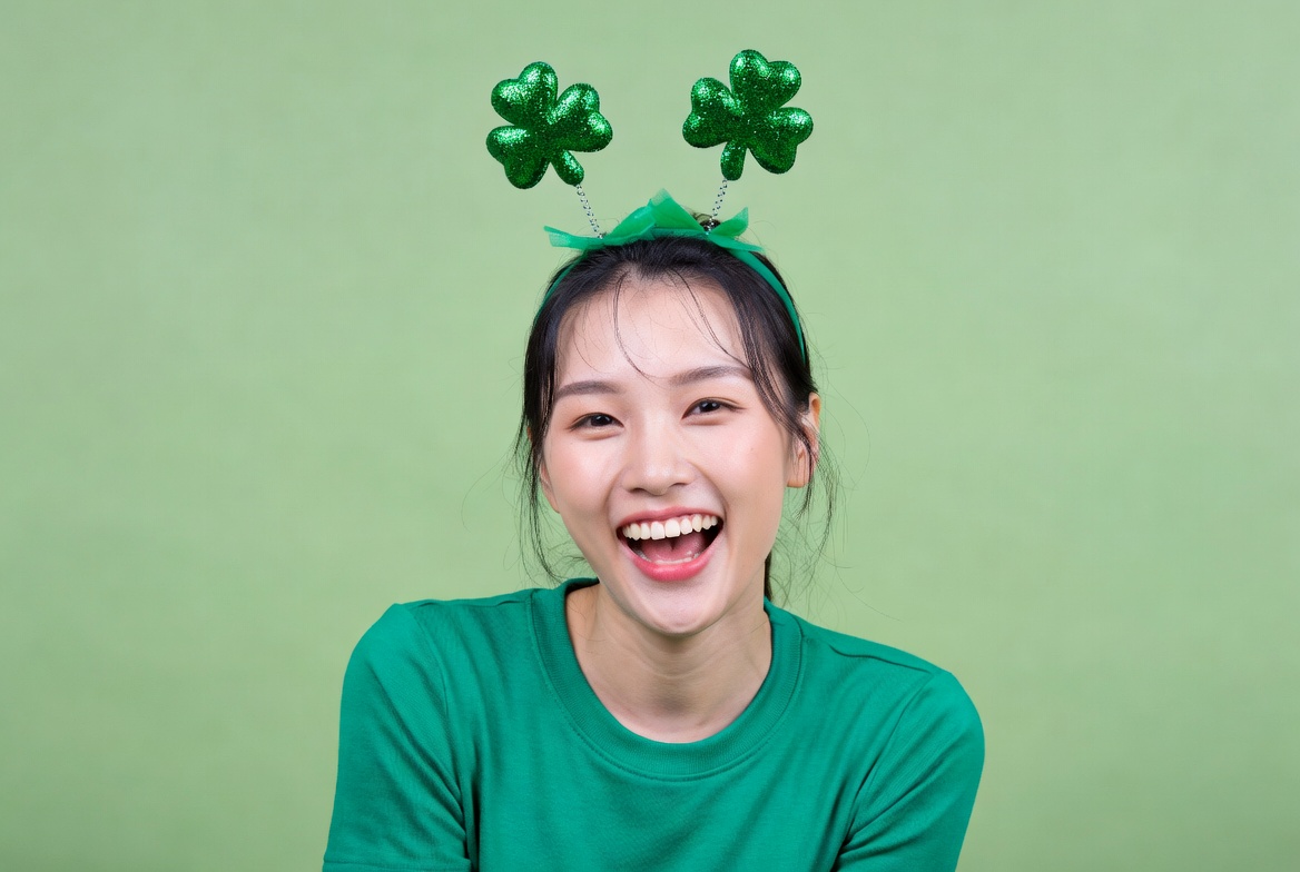 Smiling woman with green headband Smiling woman with green headband