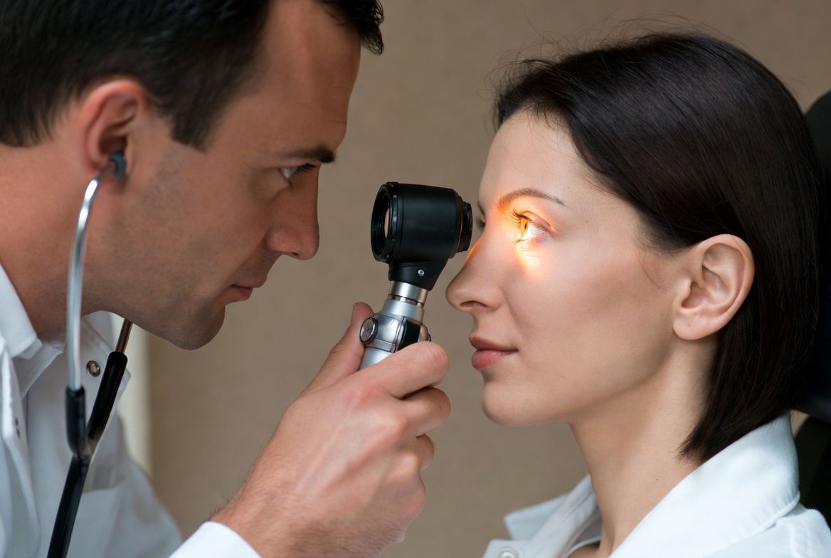 Doctor checking patient’s eye health Doctor checking patient’s eye health