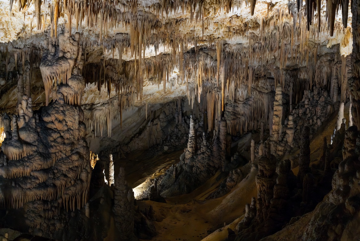 Stalactites and stalagmites in cave Stalactites and stalagmites in cave