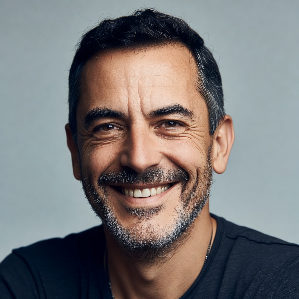 Smiling man with gray beard Smiling man with gray beard