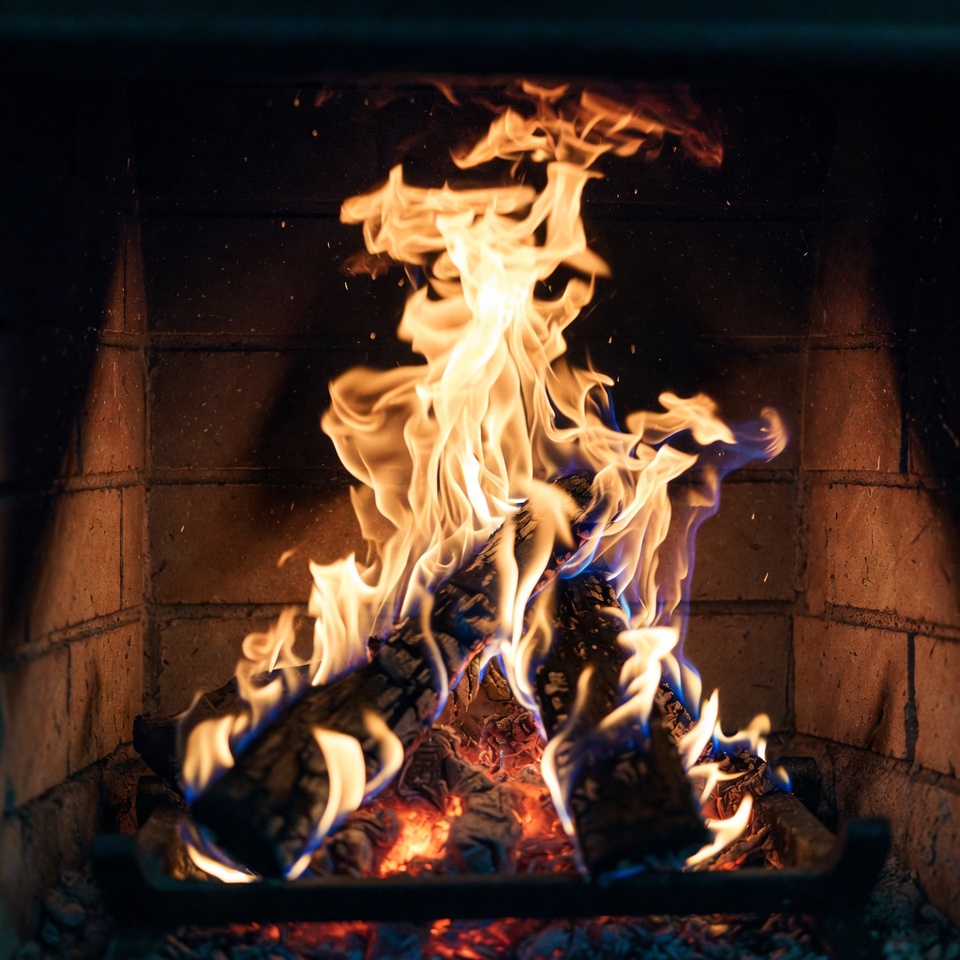 Burning Fire in Brick Fireplace Burning Fire in Brick Fireplace