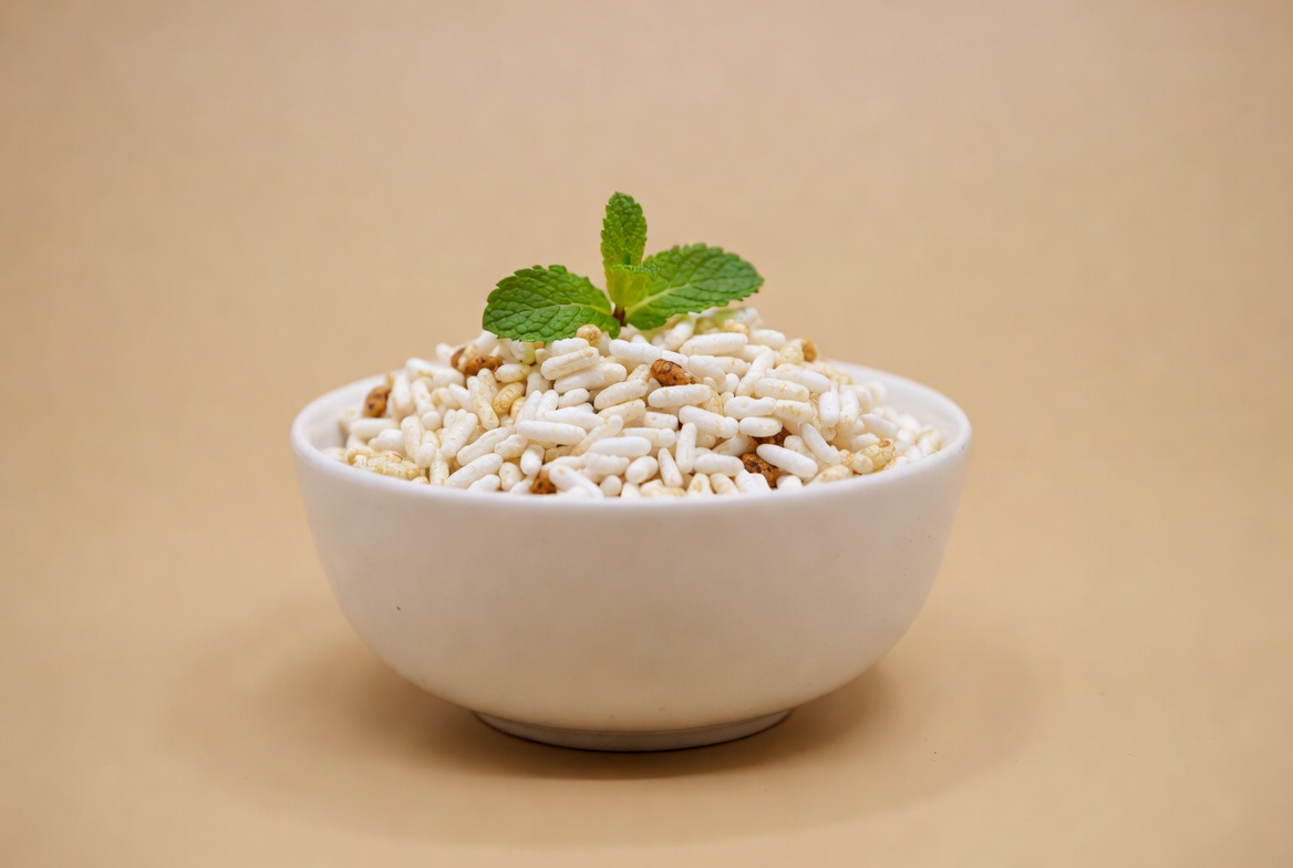 White Millet Grains in Bowl with Mint White Millet Grains in Bowl with Mint