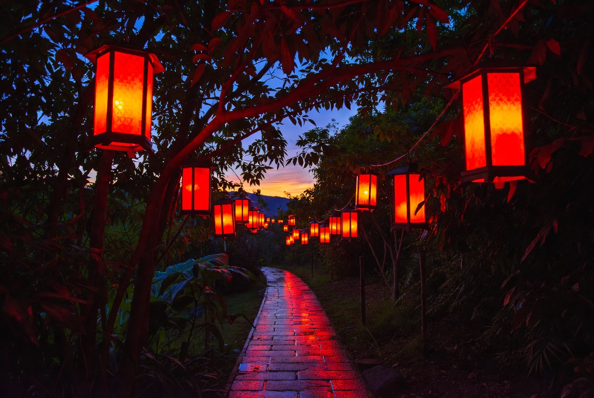 Red lanterns lighting garden path Red lanterns lighting garden path