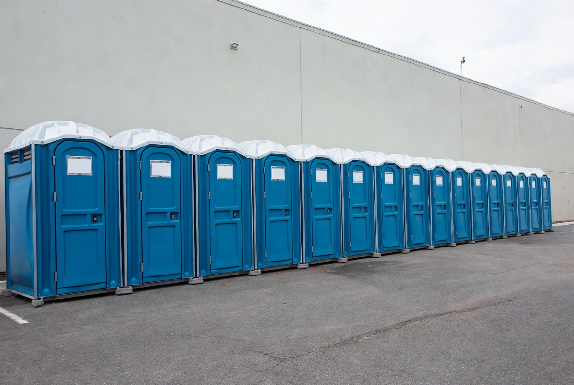 Row of Blue Portable Toilets Row of Blue Portable Toilets