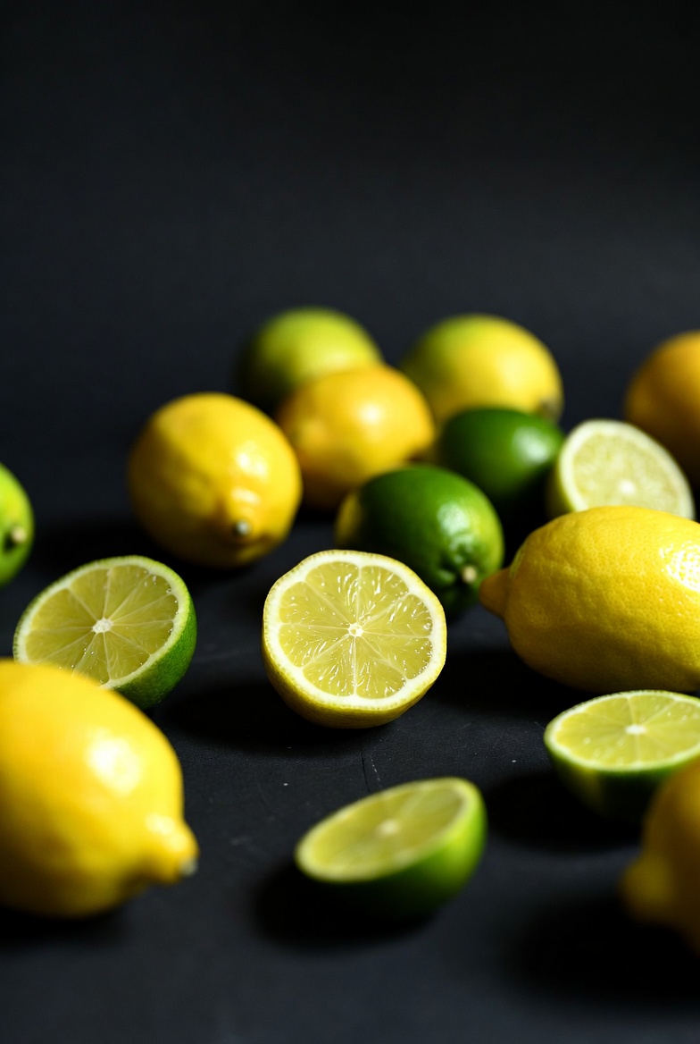 Lemons and Limes on Black Background Lemons and Limes on Black Background