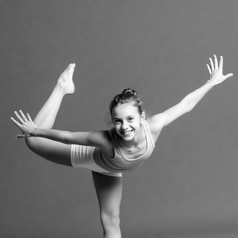 Girl performing yoga dancer pose Girl performing yoga dancer pose