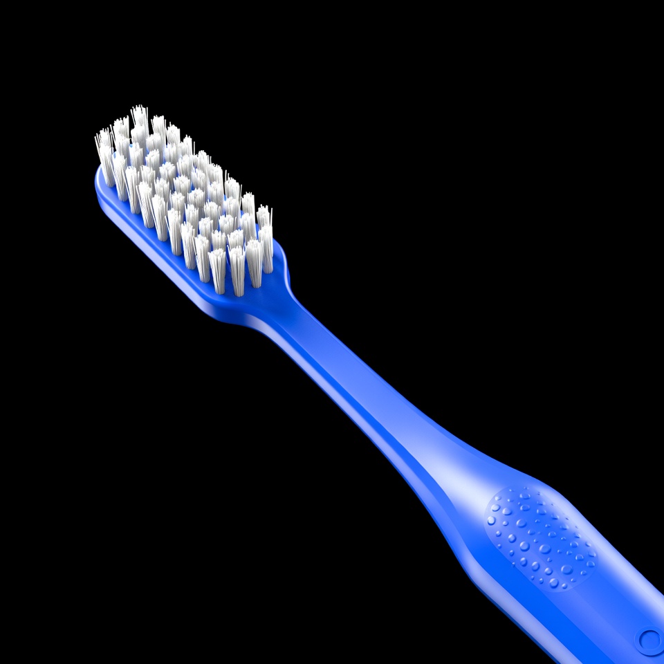 Blue toothbrush with white bristles Blue toothbrush with white bristles