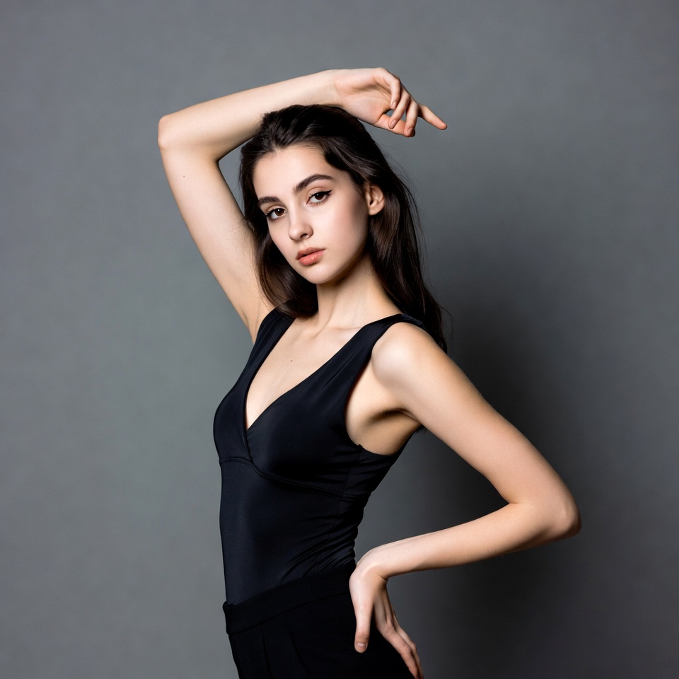 Young woman posing in black bodysuit Young woman posing in black bodysuit