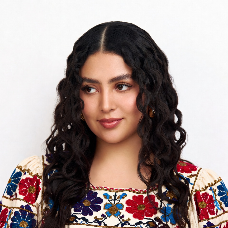 Latina woman in embroidered blouse Latina woman in embroidered blouse