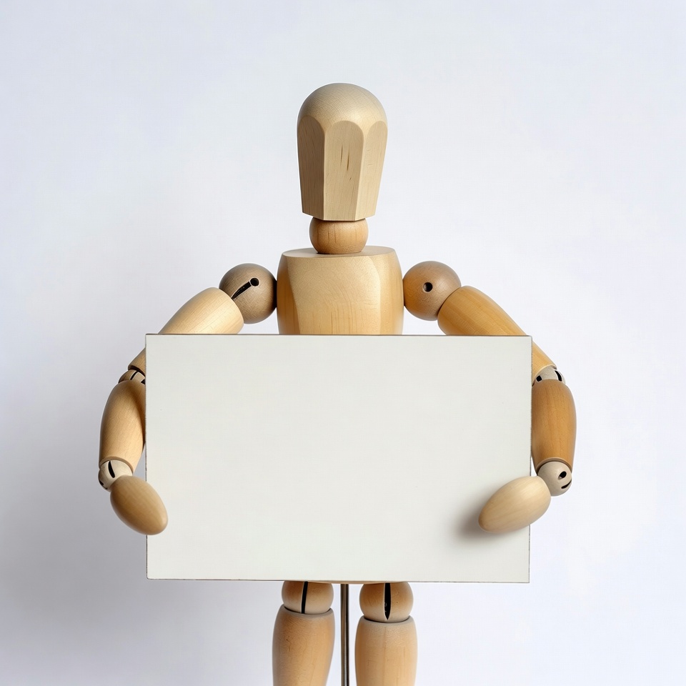 Wooden doll holding blank sign Wooden doll holding blank sign