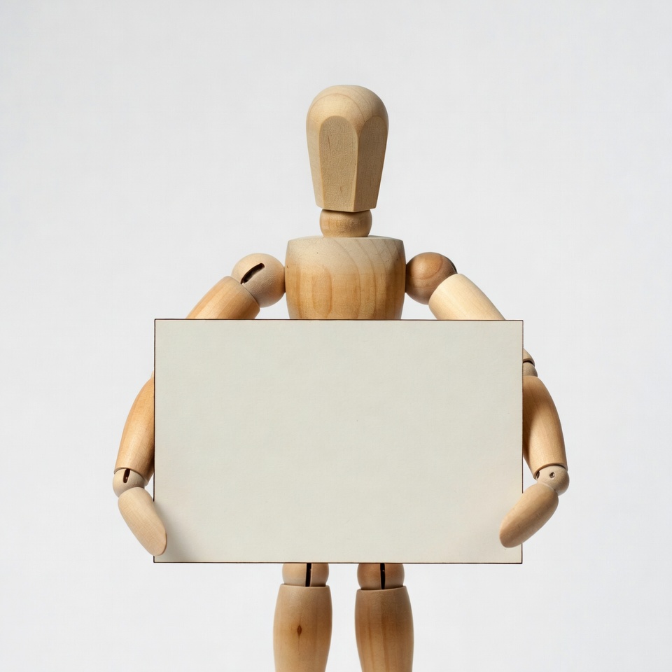 Wooden mannequin holding blank sign Wooden mannequin holding blank sign