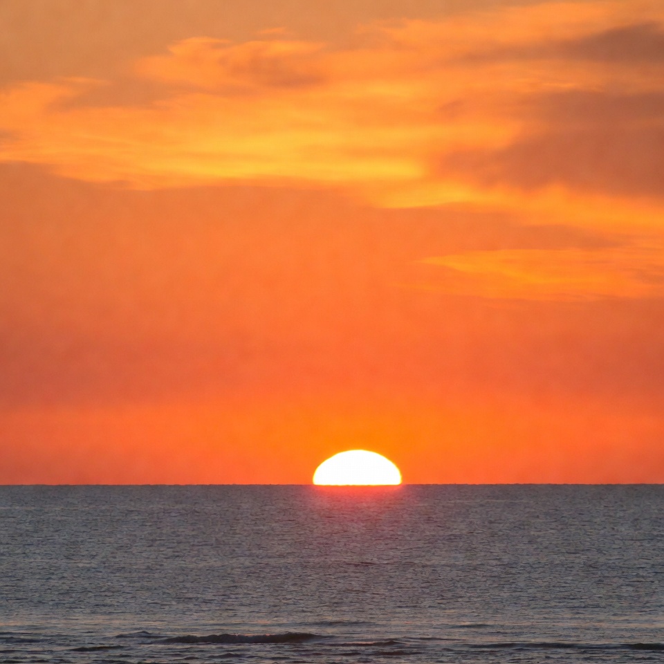 Sunset over calm ocean Sunset over calm ocean