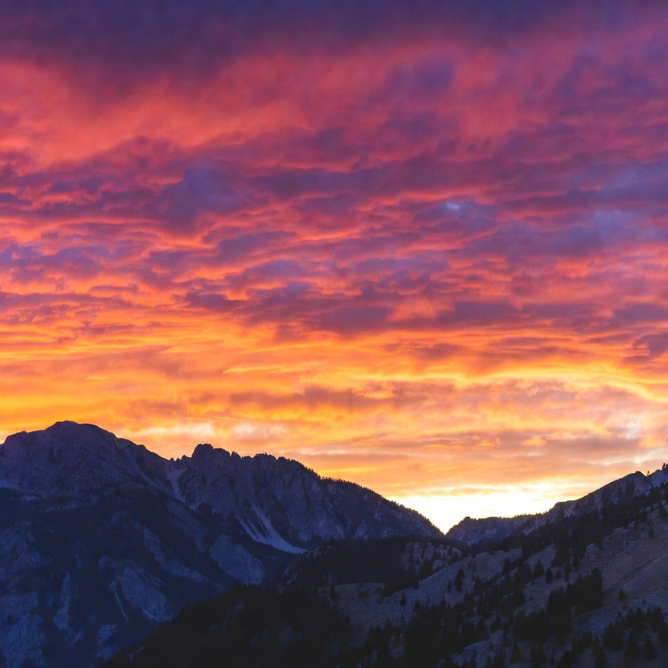 Vibrant Sunset Over Snowy Mountains Vibrant Sunset Over Snowy Mountains