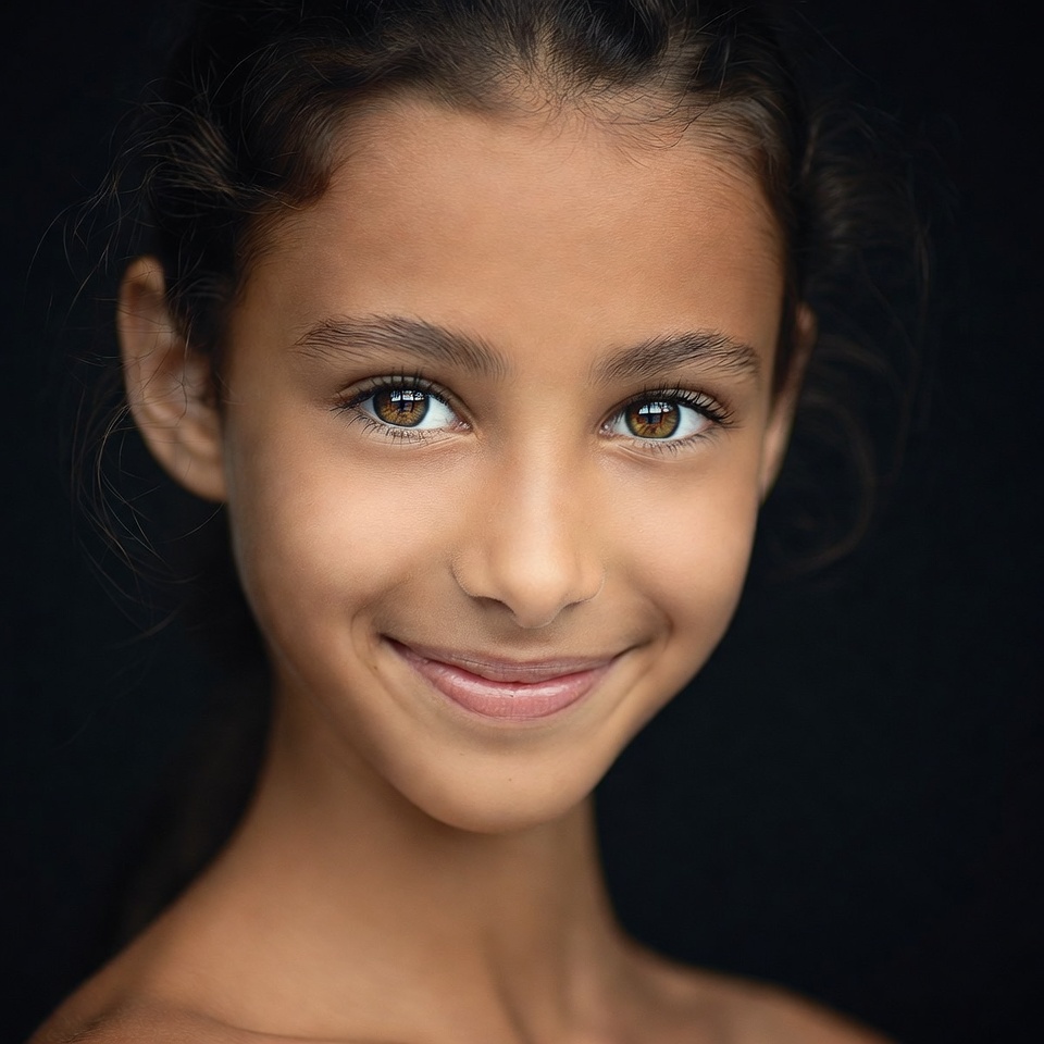 Smiling young girl with braids Smiling young girl with braids