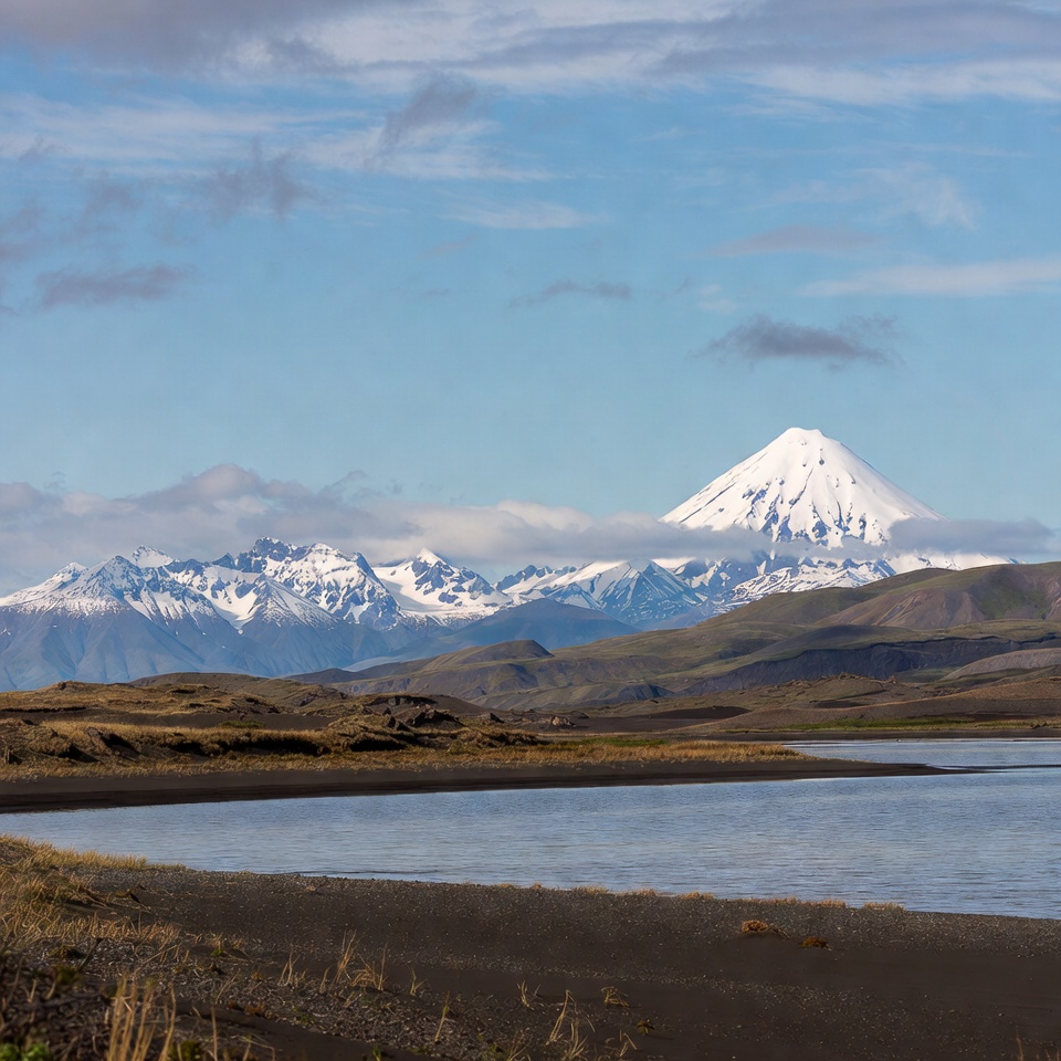 Snow-capped volcano over lake Snow-capped volcano over lake