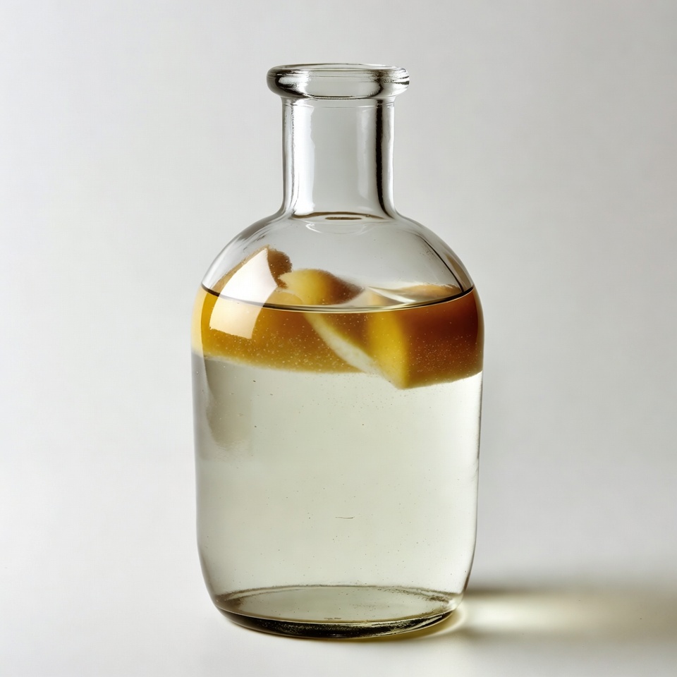 Glass bottle with lemon slices Glass bottle with lemon slices