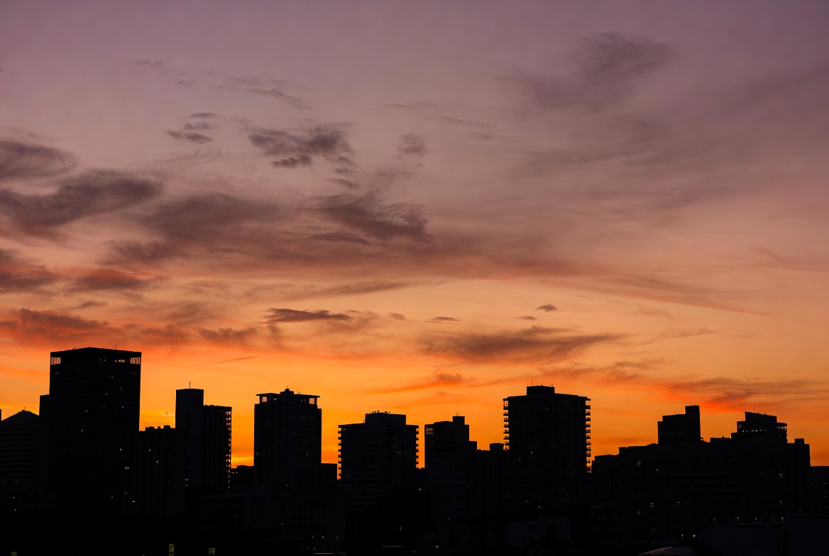 City skyline silhouette at sunset City skyline silhouette at sunset