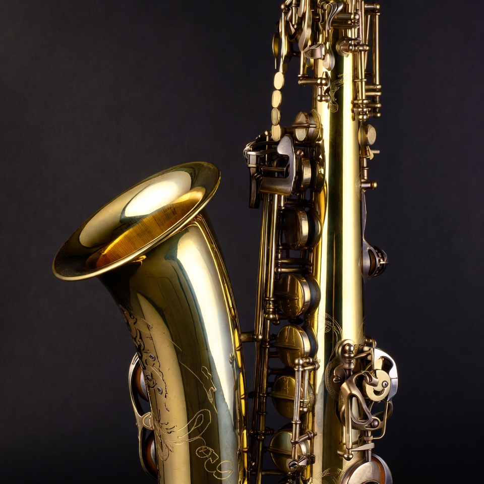 Shiny Gold Saxophone on Black Background Shiny Gold Saxophone on Black Background