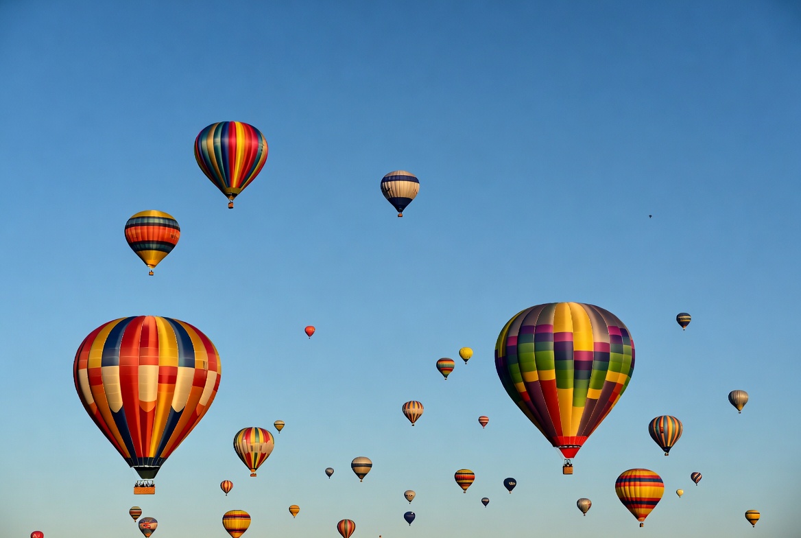 Colorful hot air balloons in blue sky Colorful hot air balloons in blue sky