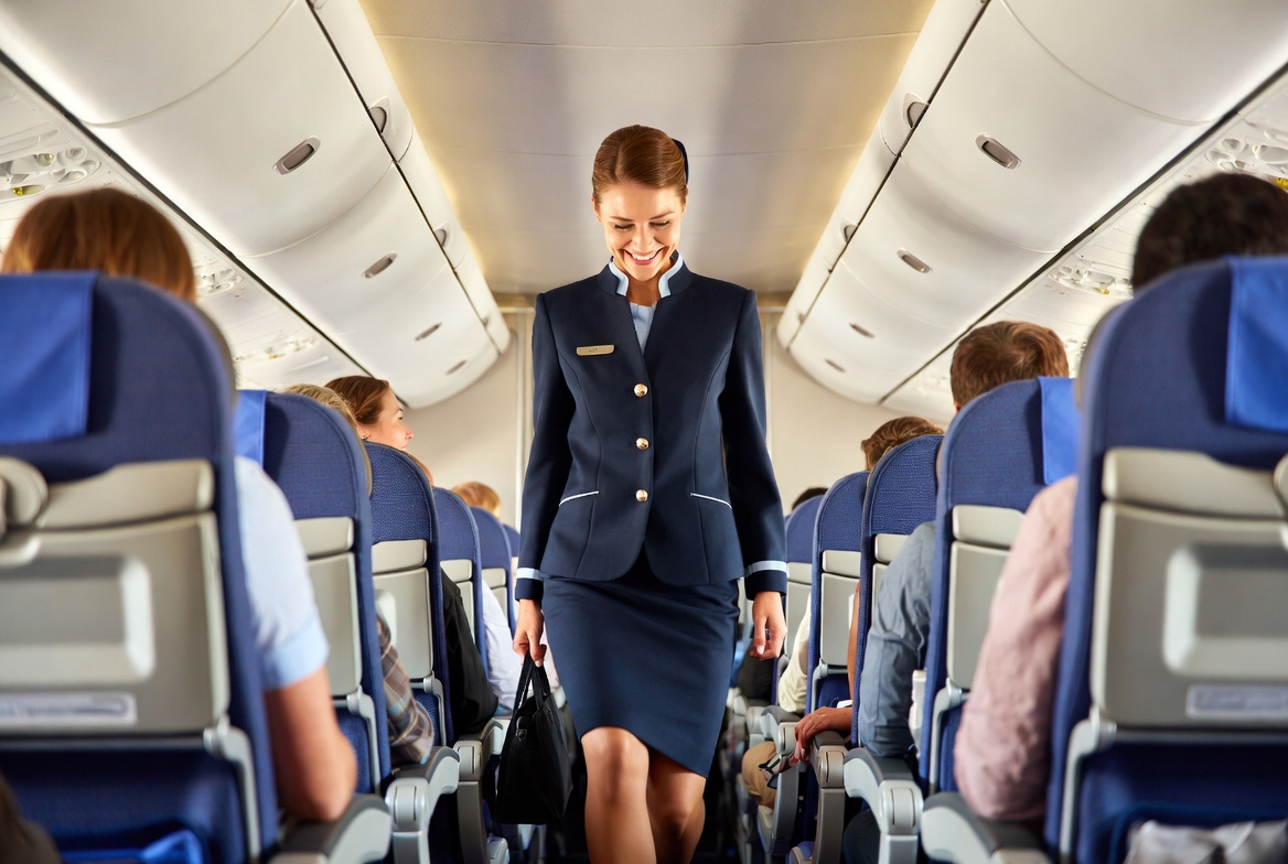 Flight Attendant Walking Airplane Aisle Flight Attendant Walking Airplane Aisle