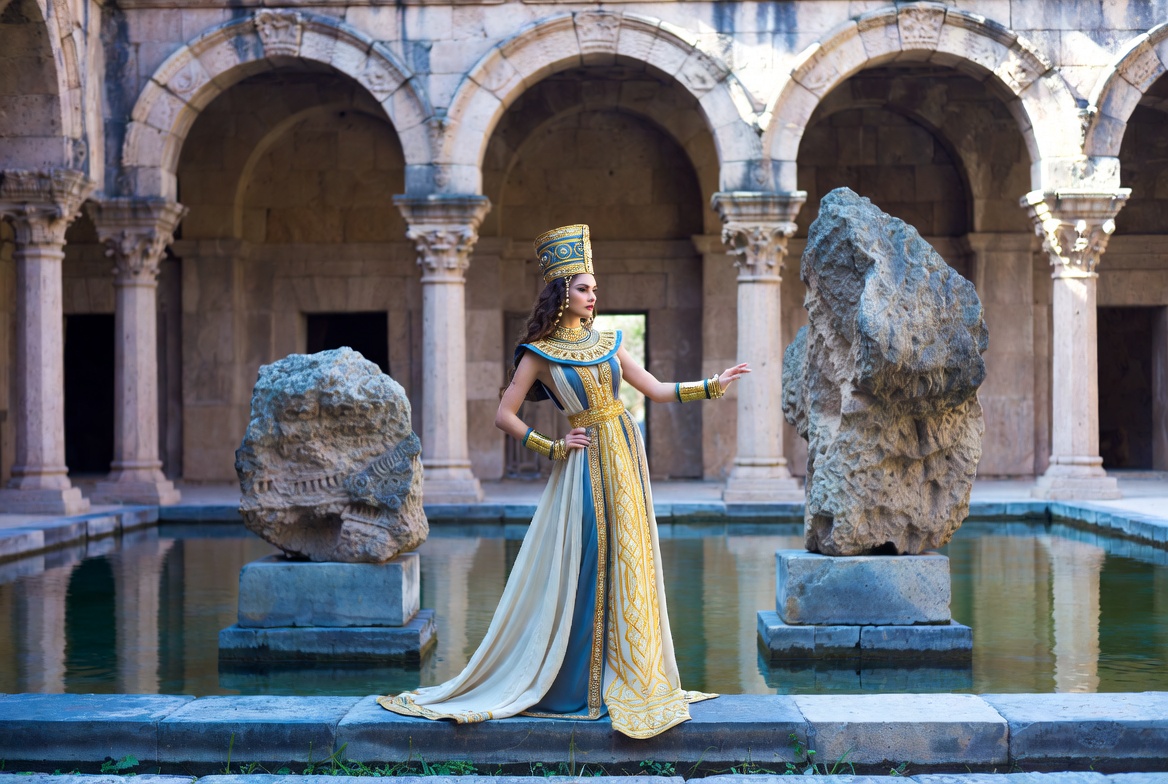 Woman in Egyptian Queen Costume at Courtyard Woman in Egyptian Queen Costume at Courtyard