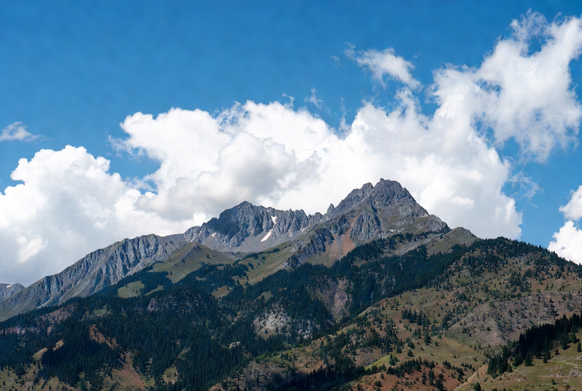 Majestic Snow-Capped Mountains Under Blue Sky Majestic Snow-Capped Mountains Under Blue Sky