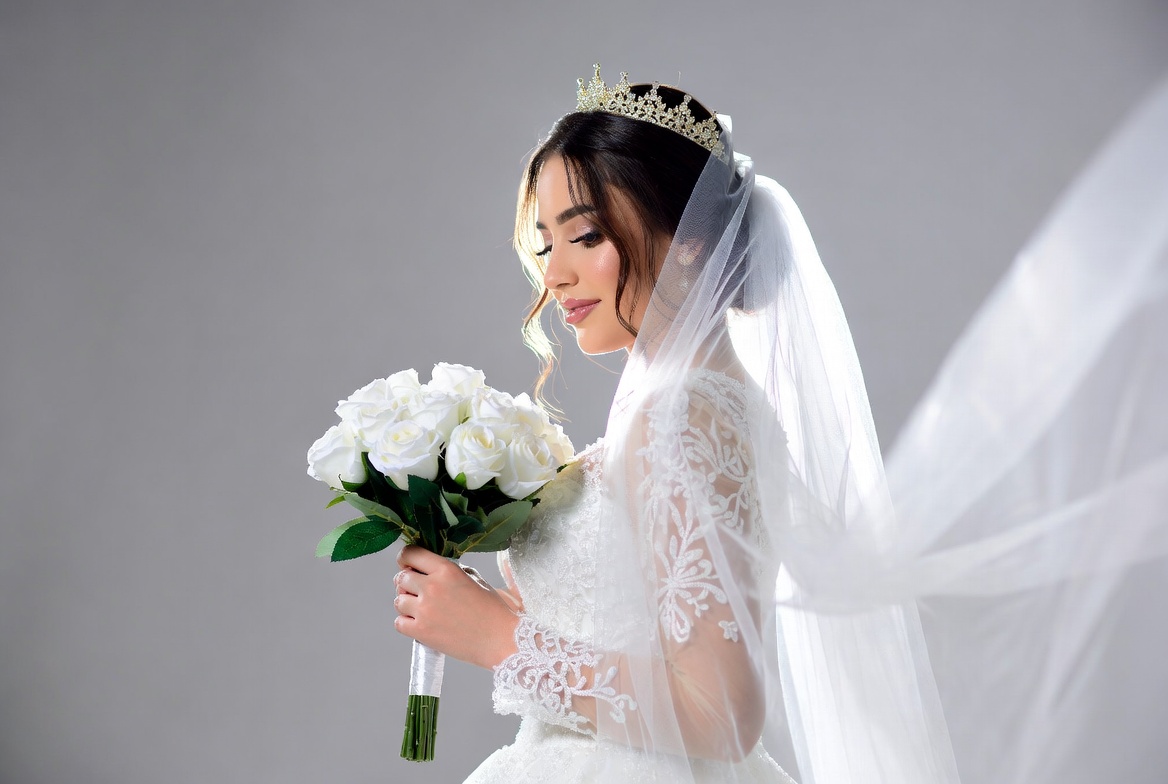 Bride holding white roses bouquet Bride holding white roses bouquet