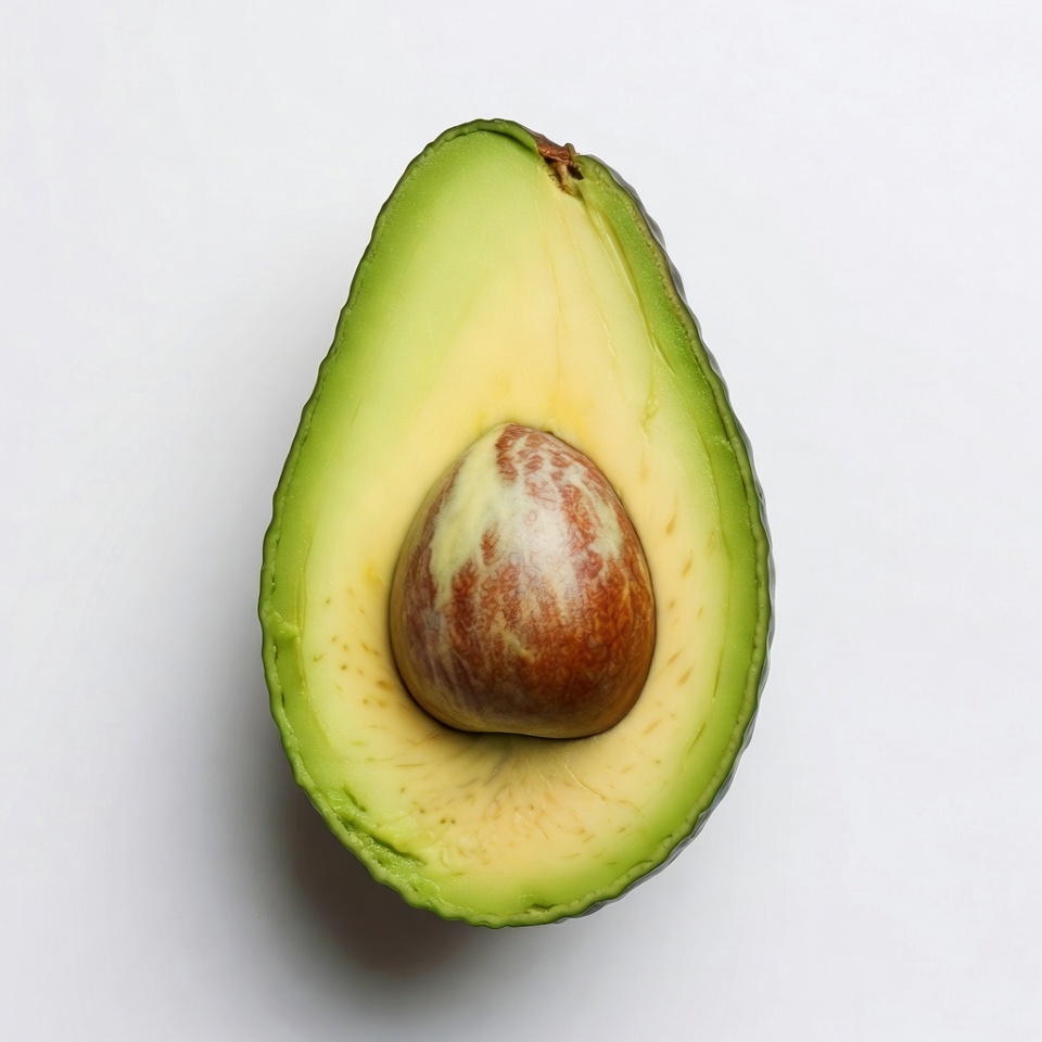 Sliced Avocado on White Background Sliced Avocado on White Background