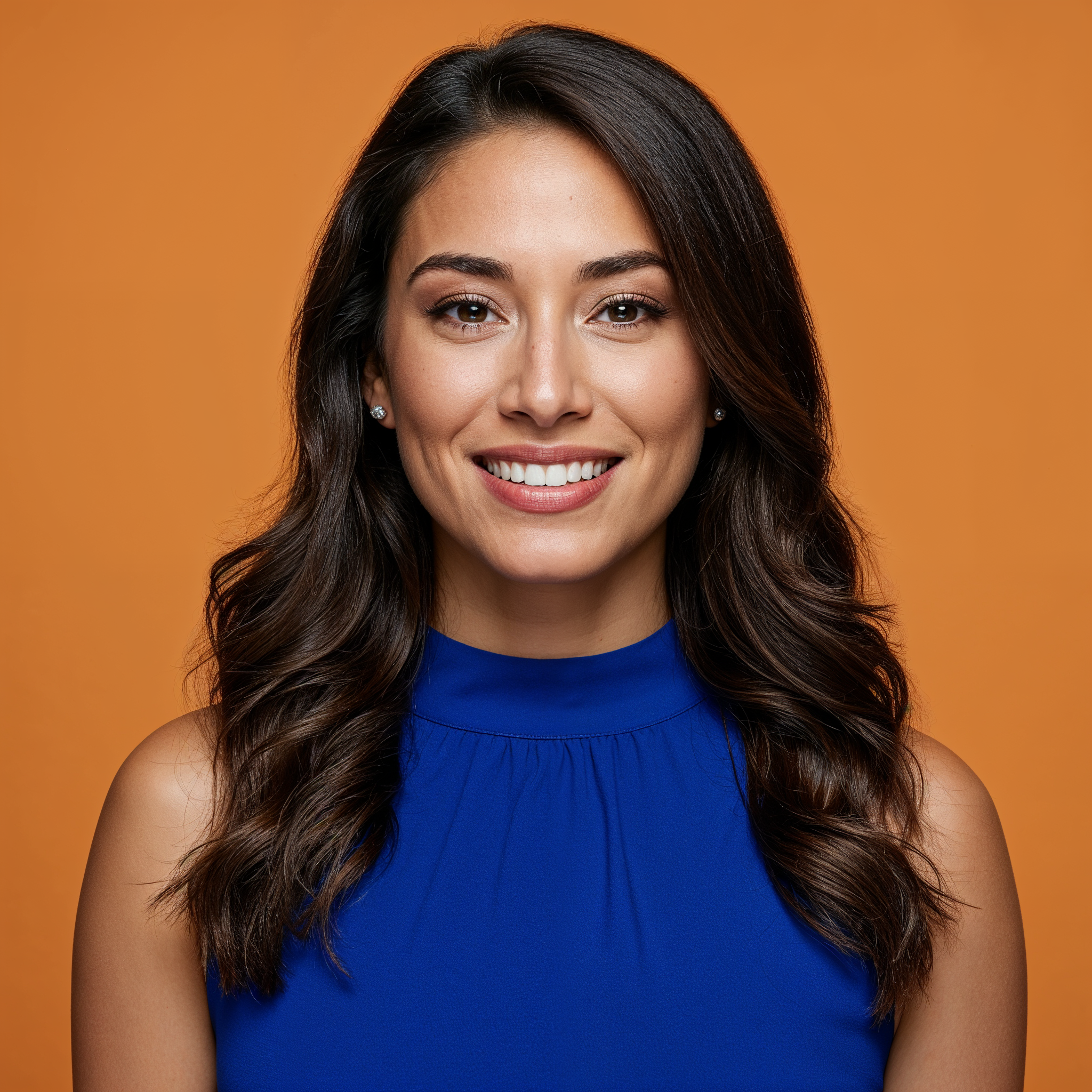 Smiling Latina woman on orange background Smiling Latina woman on orange background