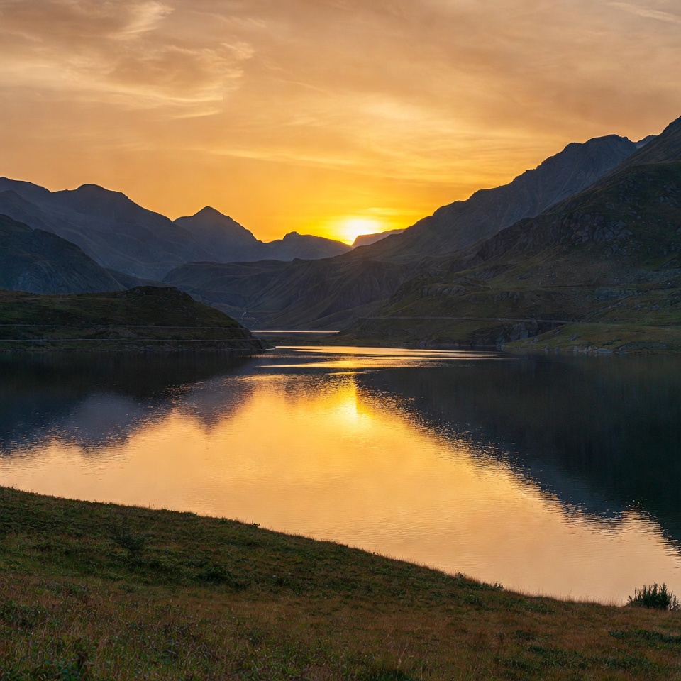 Sunset over mountain lake Sunset over mountain lake
