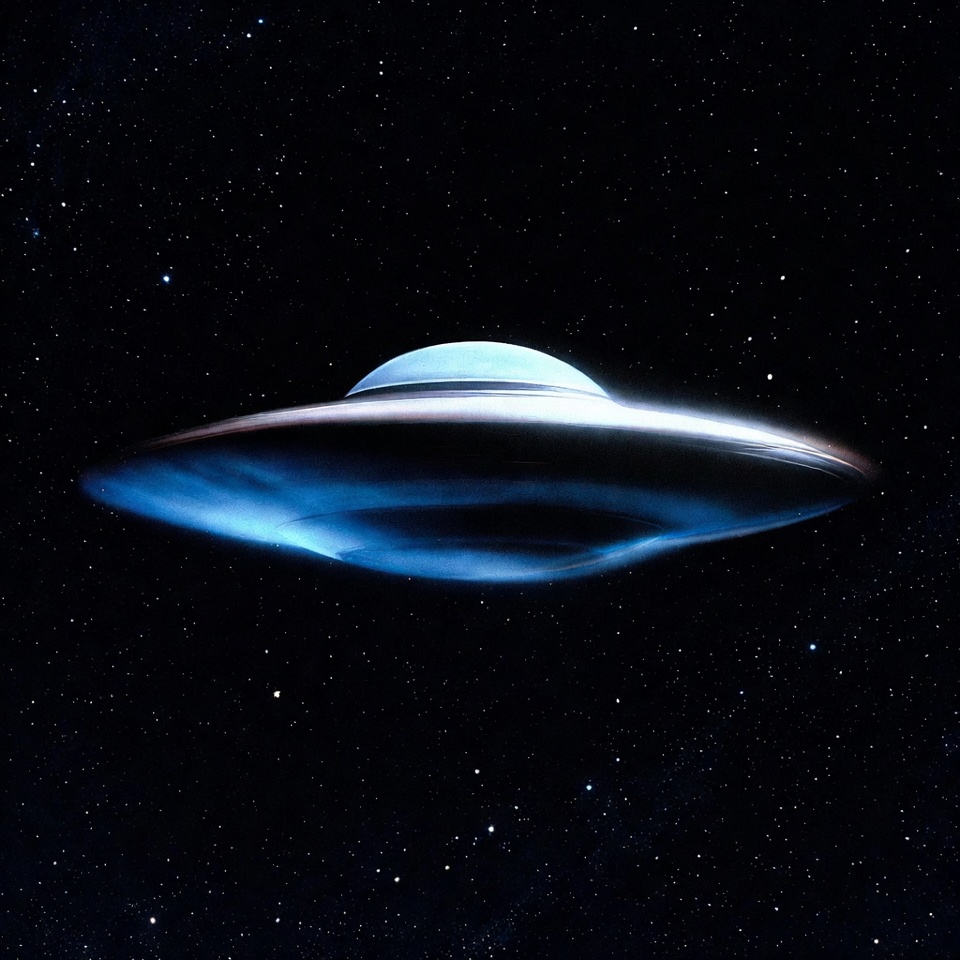 Glowing UFO in starry space Glowing UFO in starry space