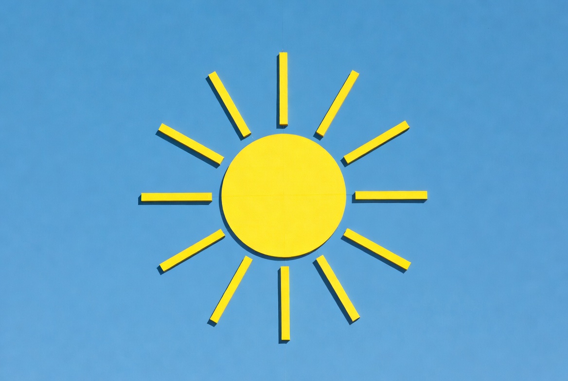 Yellow sun on blue background Yellow sun on blue background