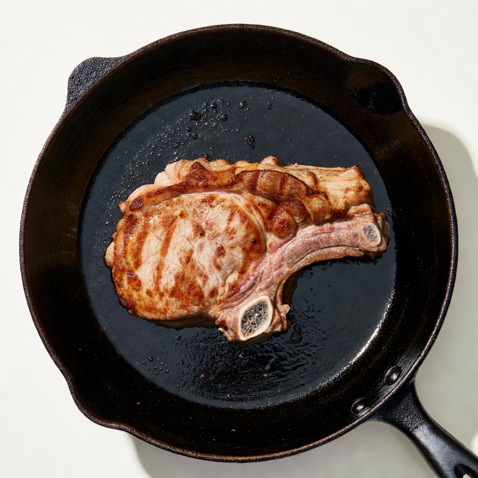 Grilled Pork Chop in Cast Iron Skillet Grilled Pork Chop in Cast Iron Skillet