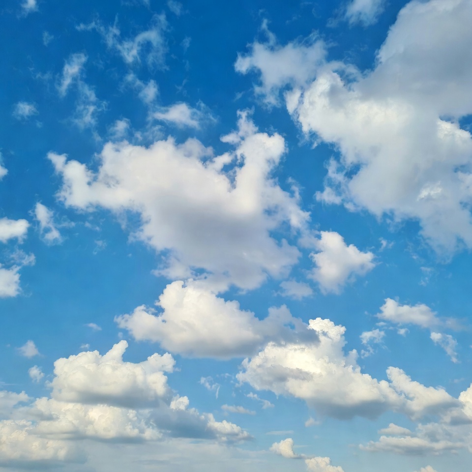 Fluffy white clouds in blue sky Fluffy white clouds in blue sky