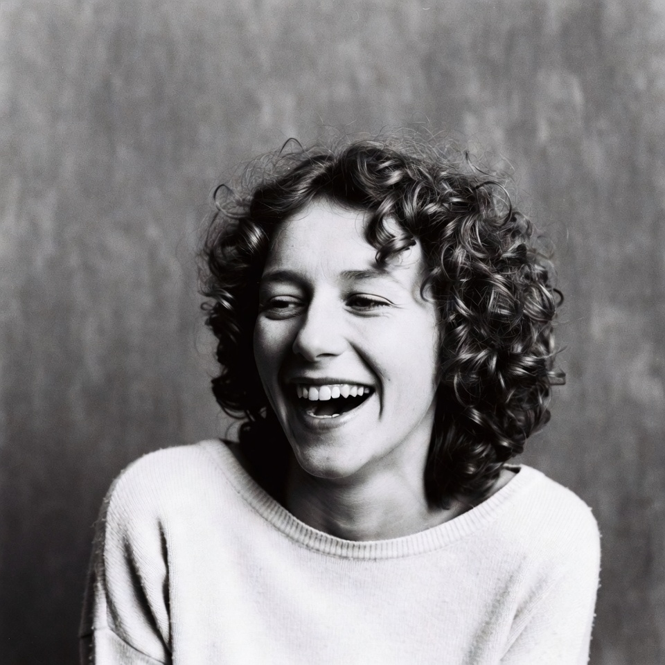 Smiling woman with curly hair Smiling woman with curly hair
