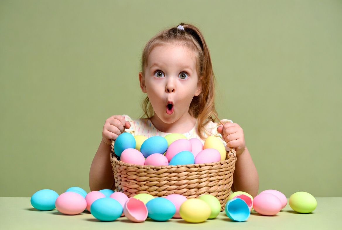 Girl holding colorful Easter eggs Girl holding colorful Easter eggs