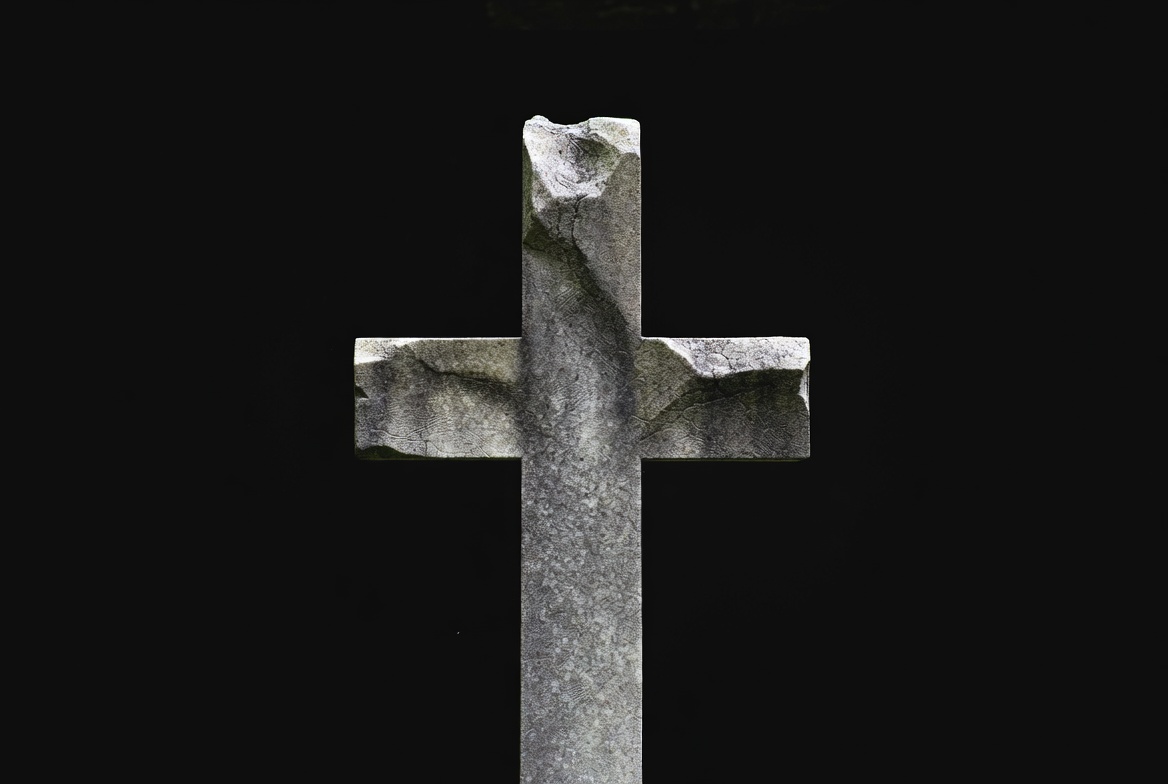 Stone Cross on Black Background Stone Cross on Black Background