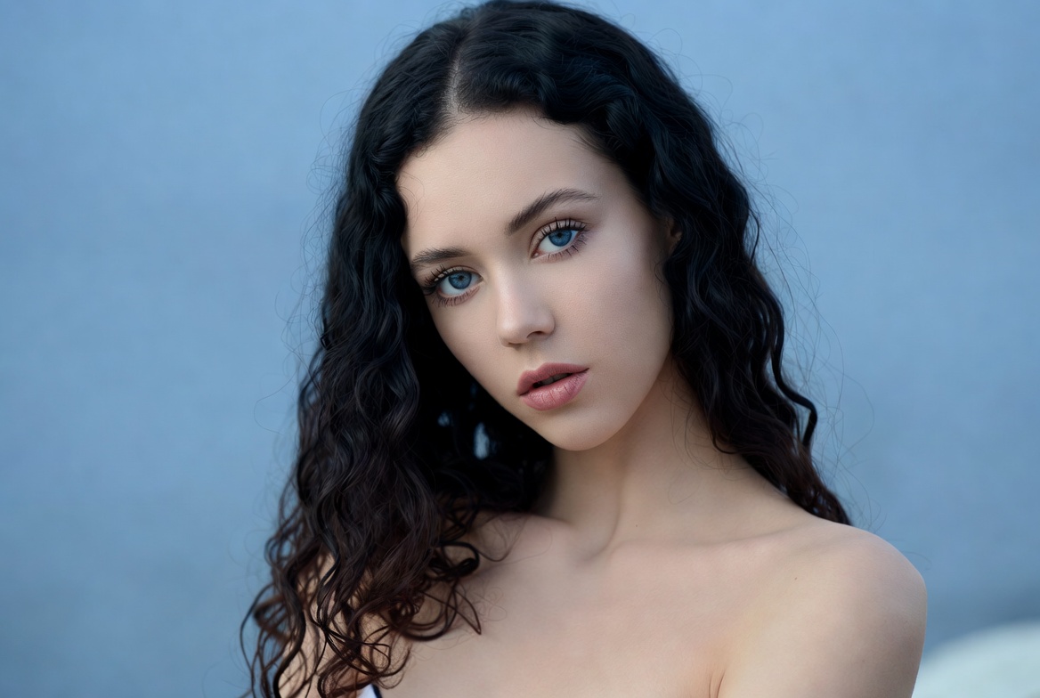 Woman with curly black hair Woman with curly black hair