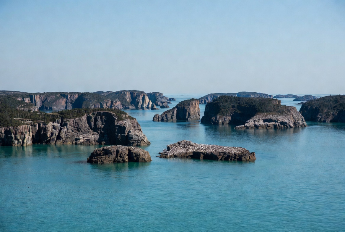 Turquoise Sea with Rocky Islands Turquoise Sea with Rocky Islands