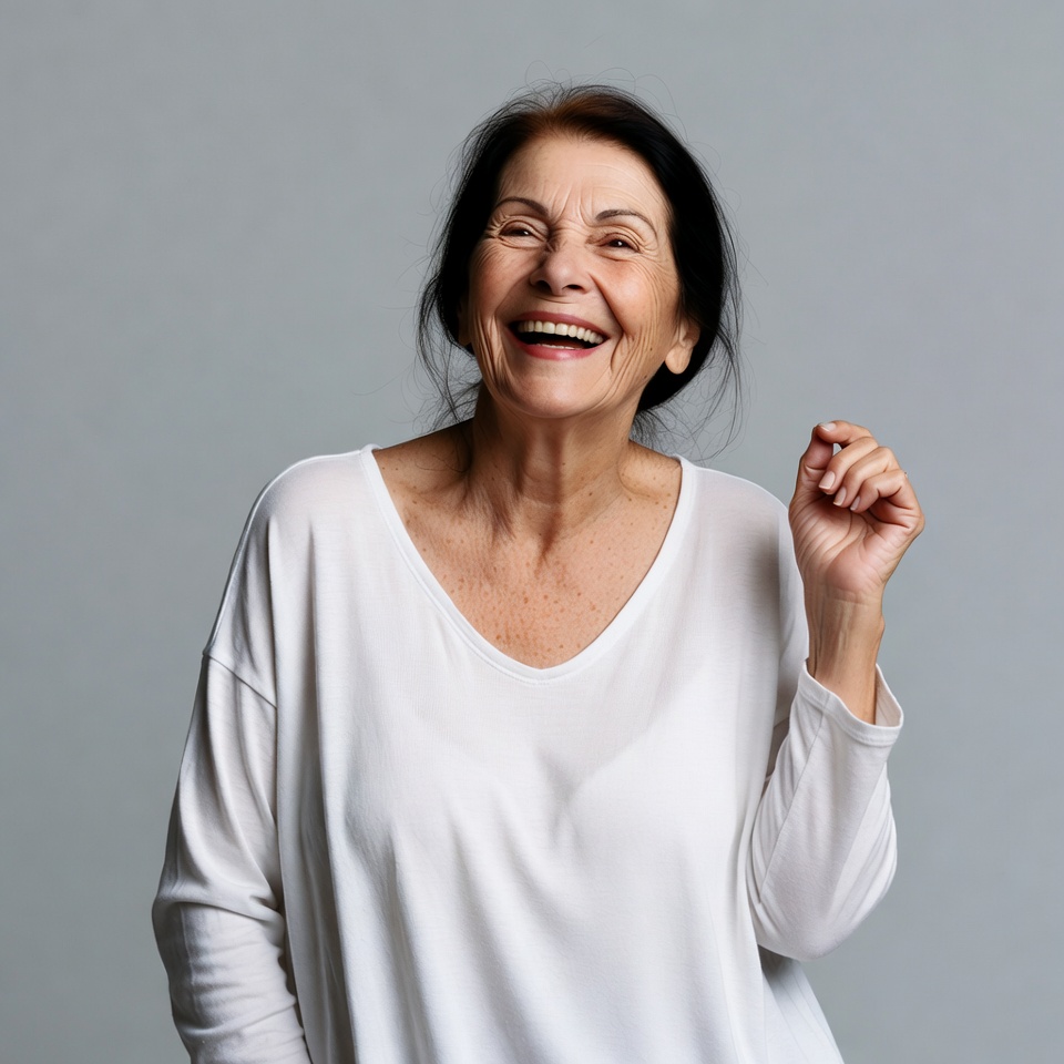 Elderly woman laughing joyfully Elderly woman laughing joyfully