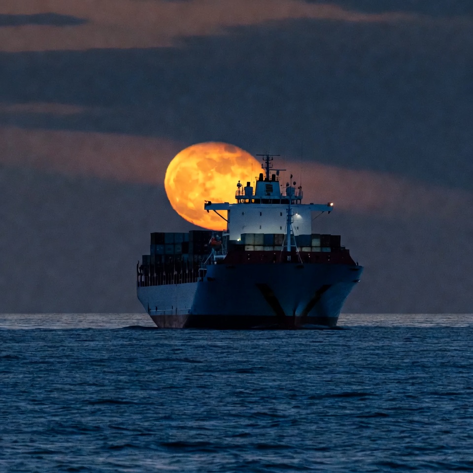 Cargo Ship with Supermoon Rising Cargo Ship with Supermoon Rising