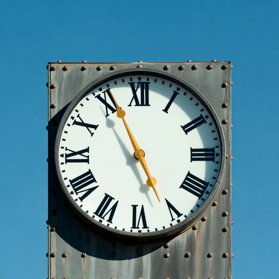 Large Roman numeral clock on blue sky Large Roman numeral clock on blue sky