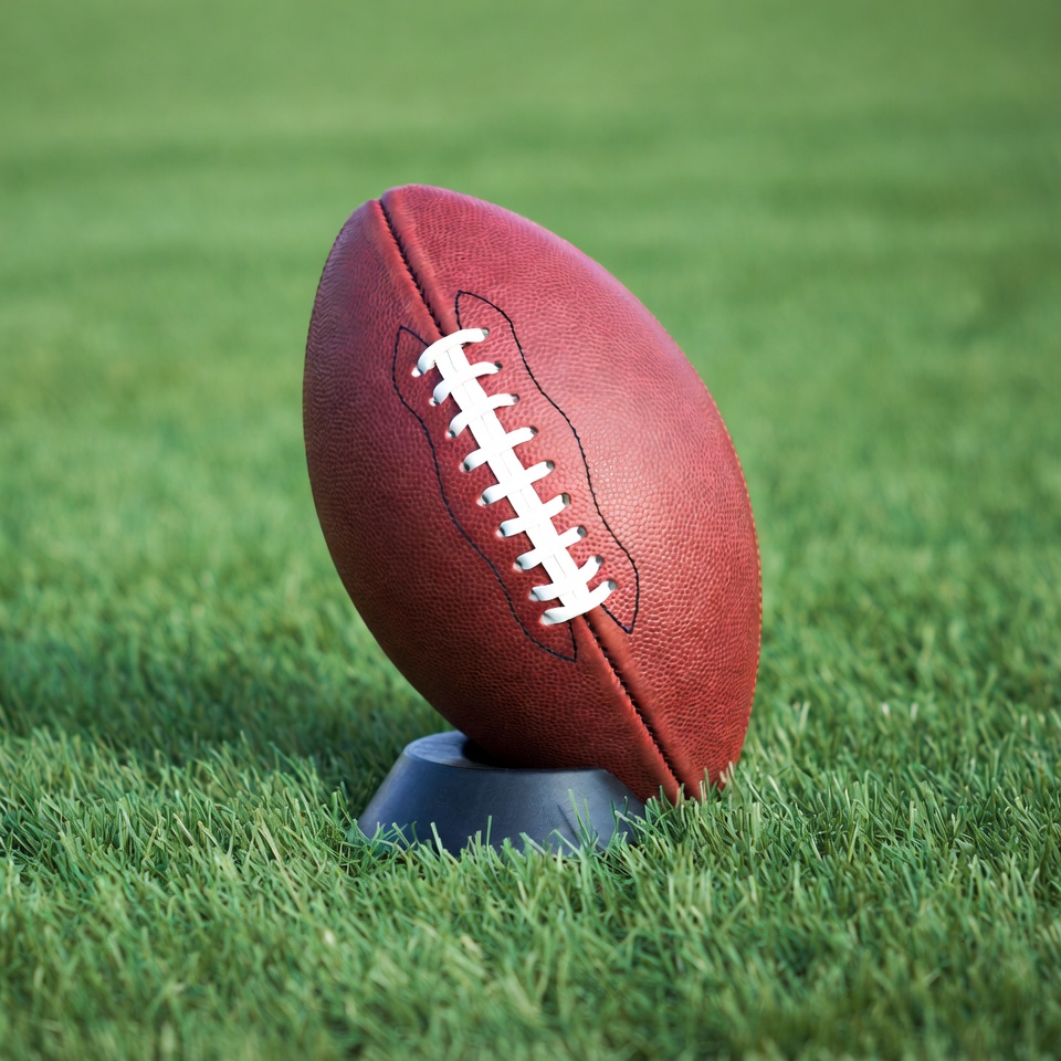 Football on grass field Football on grass field