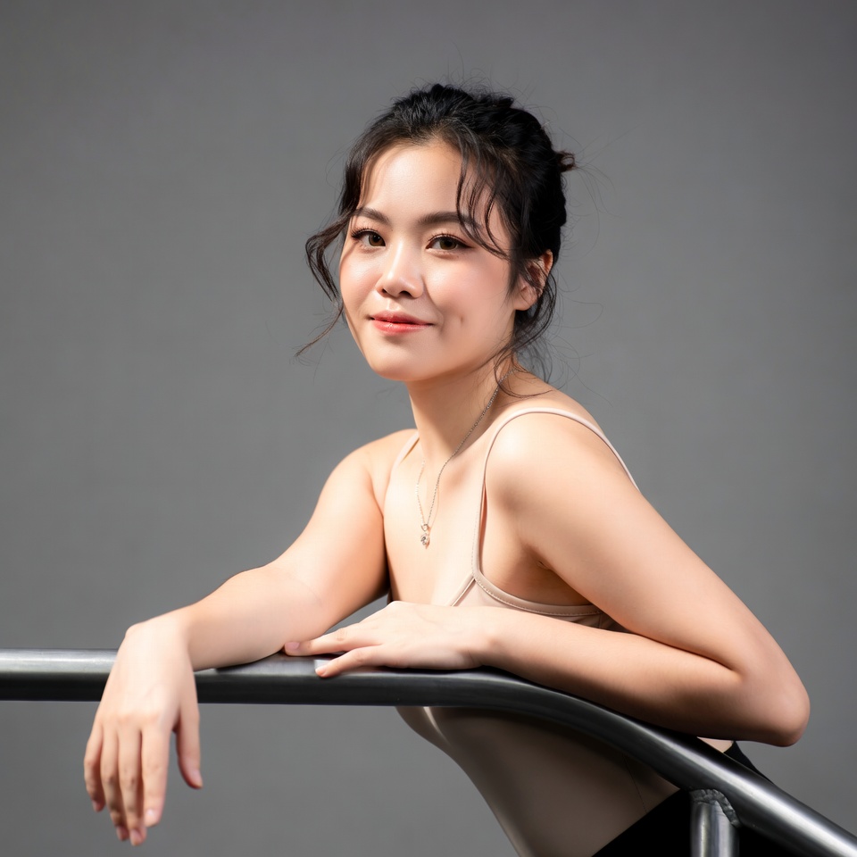 Asian woman leaning on railing Asian woman leaning on railing