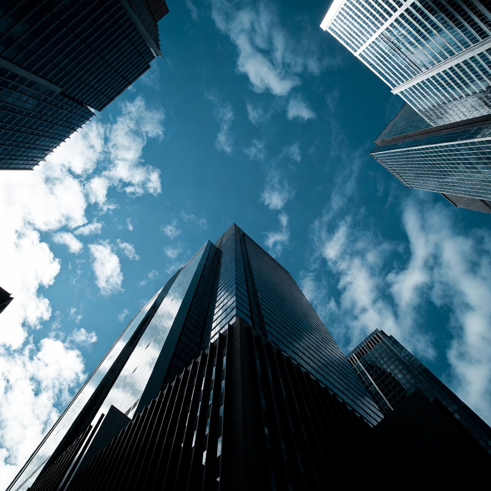 Skyscrapers Towering Against Blue Sky Skyscrapers Towering Against Blue Sky