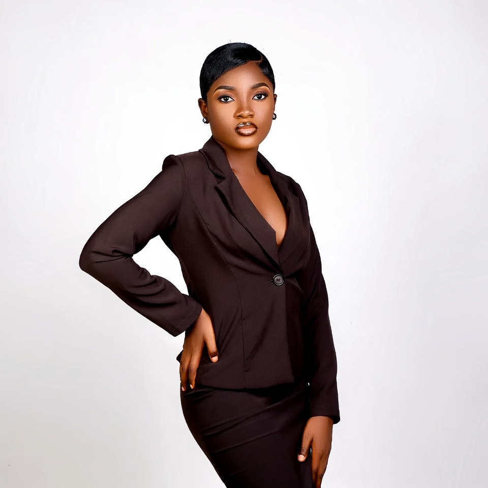 African-American woman in brown suit African-American woman in brown suit